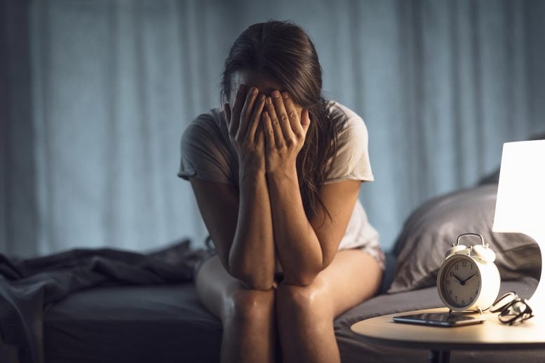 Very Depressed Woman on Bed